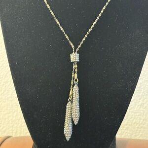 Kiam Family “negligee” dangling drop pendants encrusted with pave crystals